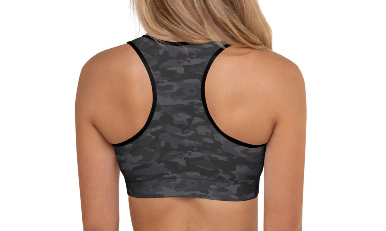 Back view of a woman wearing the Stealth Camo Pickleball Padded Sports Bra, showcasing the racerback design and stealth camouflage print.
