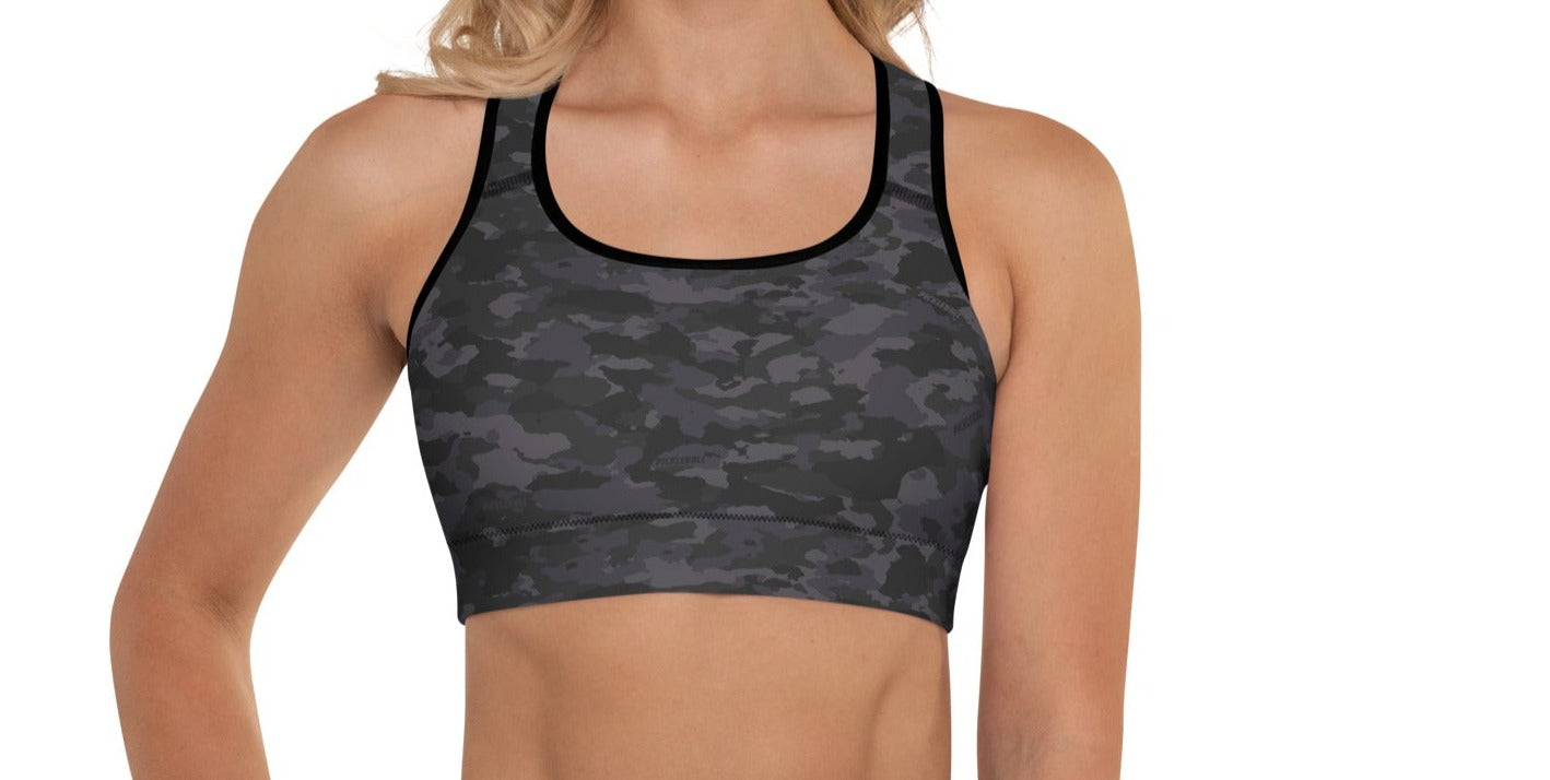 Front view of a woman wearing the Stealth Camo Pickleball Padded Sports Bra, highlighting the scoop neckline and camouflage print.