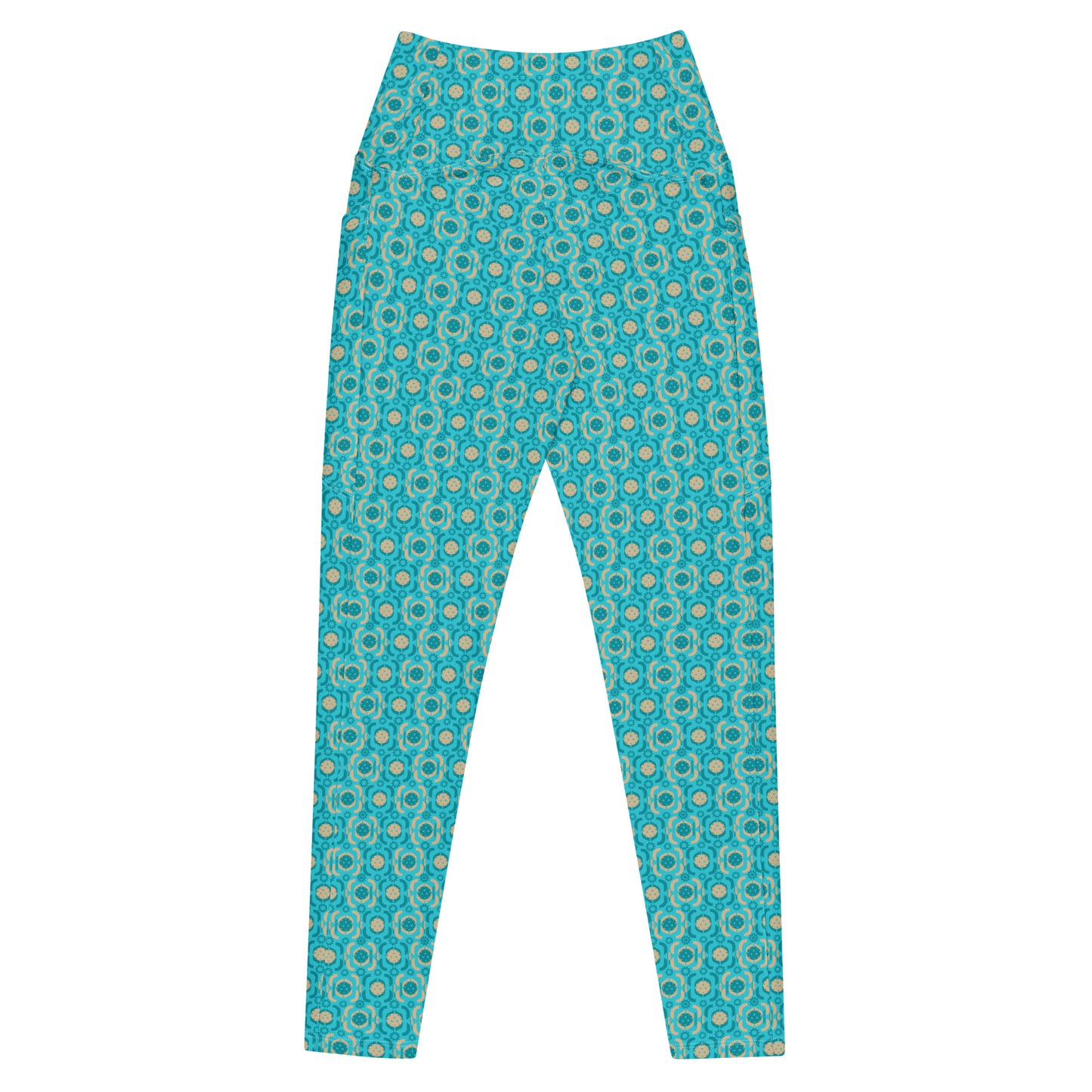 Vibrant turquoise pickleball leggings with intricate circle pattern, showcasing a snug, high-waisted fit and dual side pockets for convenience during games.