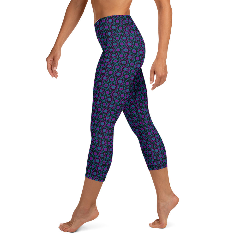 Side view of a female athlete in Purple Playmaker Pickleball Yoga Capri Leggings, displaying the unique purple swirl design on the left. Designed for high performance and flexibility in pickleball and yoga.