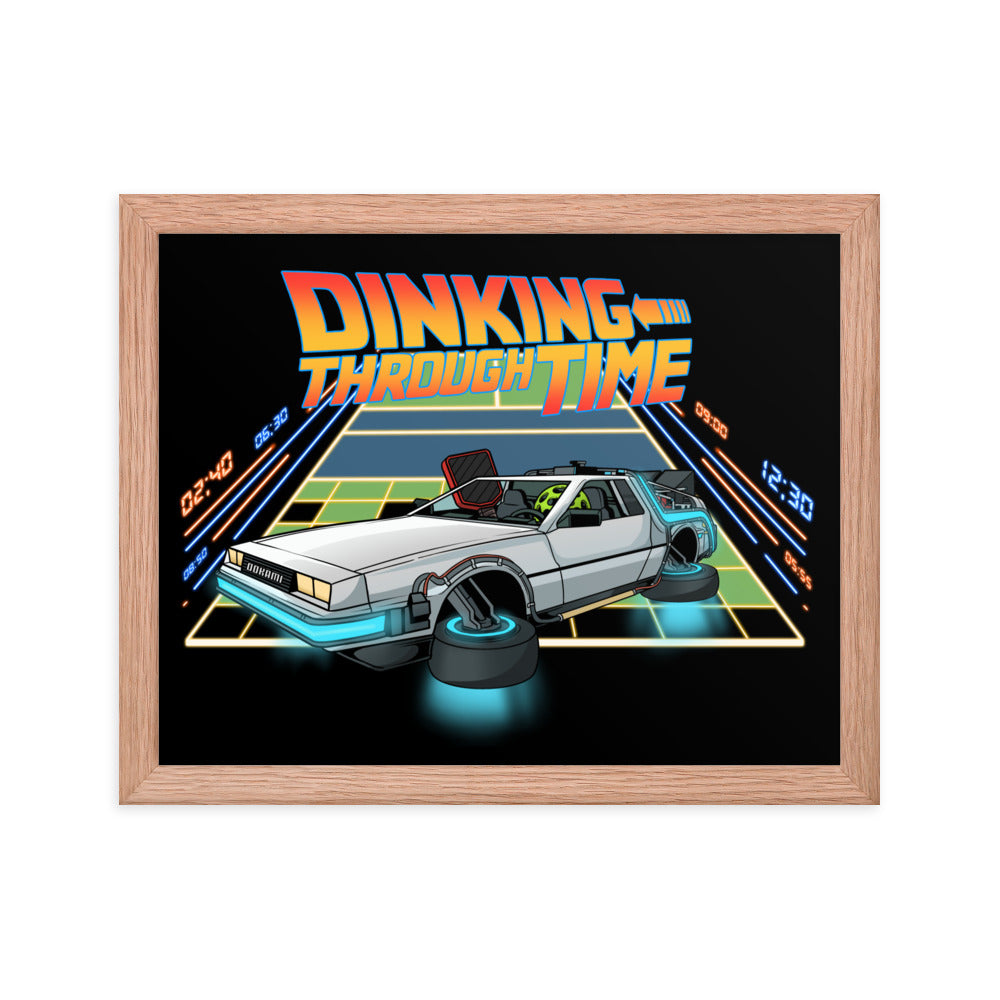 Framed poster of a DeLorean with the text 'Dinking Through Time' in a red oak frame, size 11x14 inches.
