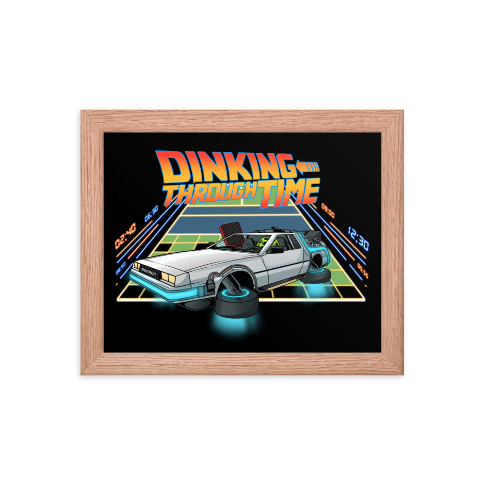 Framed poster of a DeLorean with the text 'Dinking Through Time' in a red oak frame, size 8x10 inches.