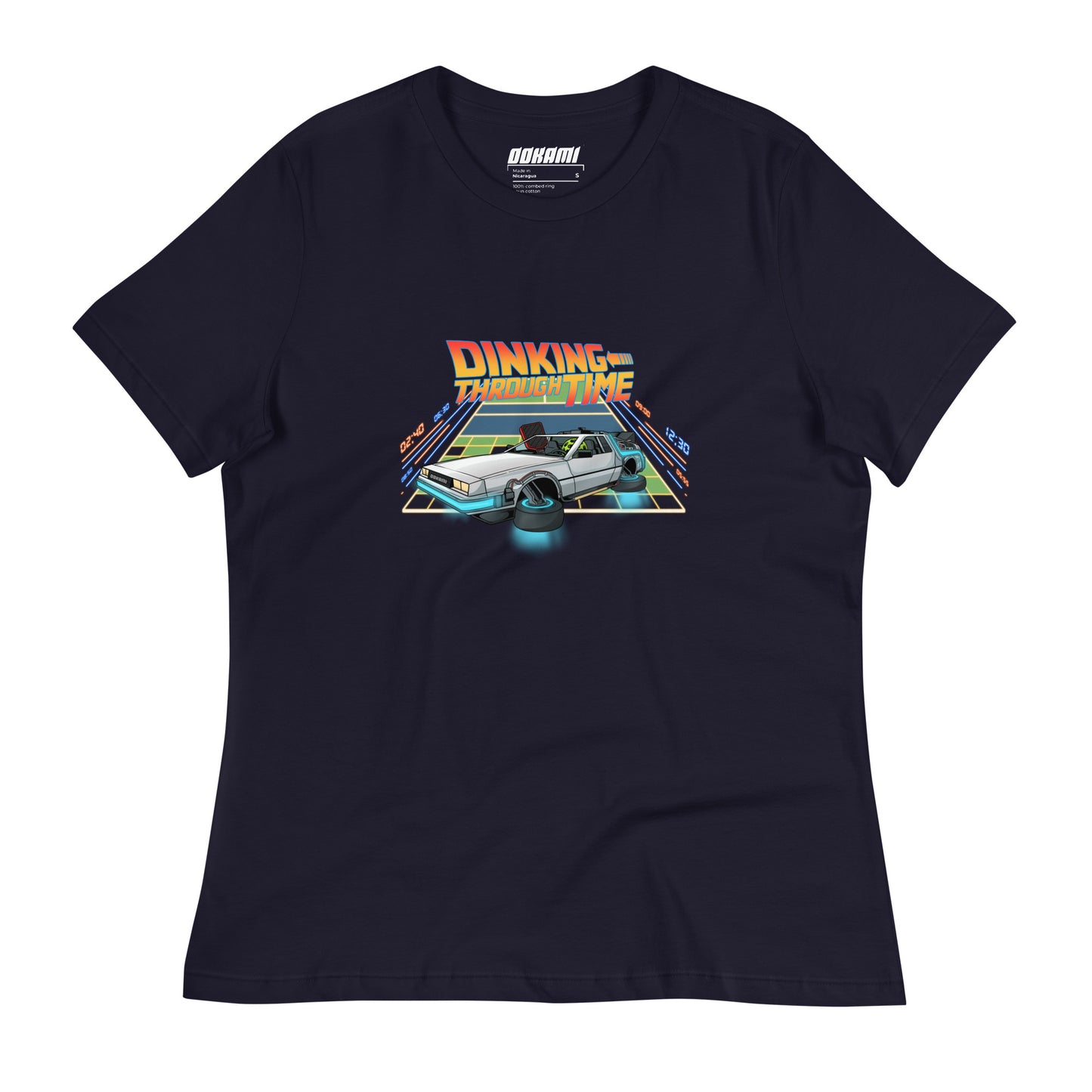Front view of a navy women's relaxed t-shirt featuring the colorful 'Dinking Through Time' pickleball design with a nostalgic time-travel theme.