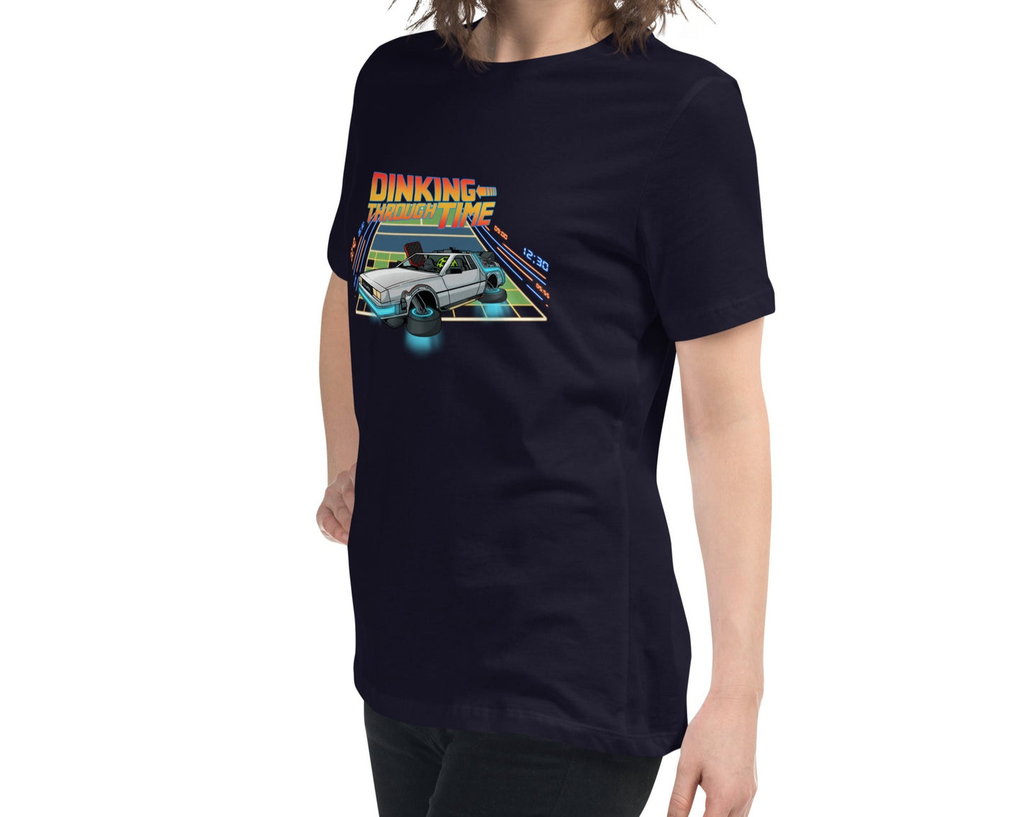 Side view of a navy women's relaxed t-shirt featuring the 'Dinking Through Time' pickleball design, highlighting the fit and design.