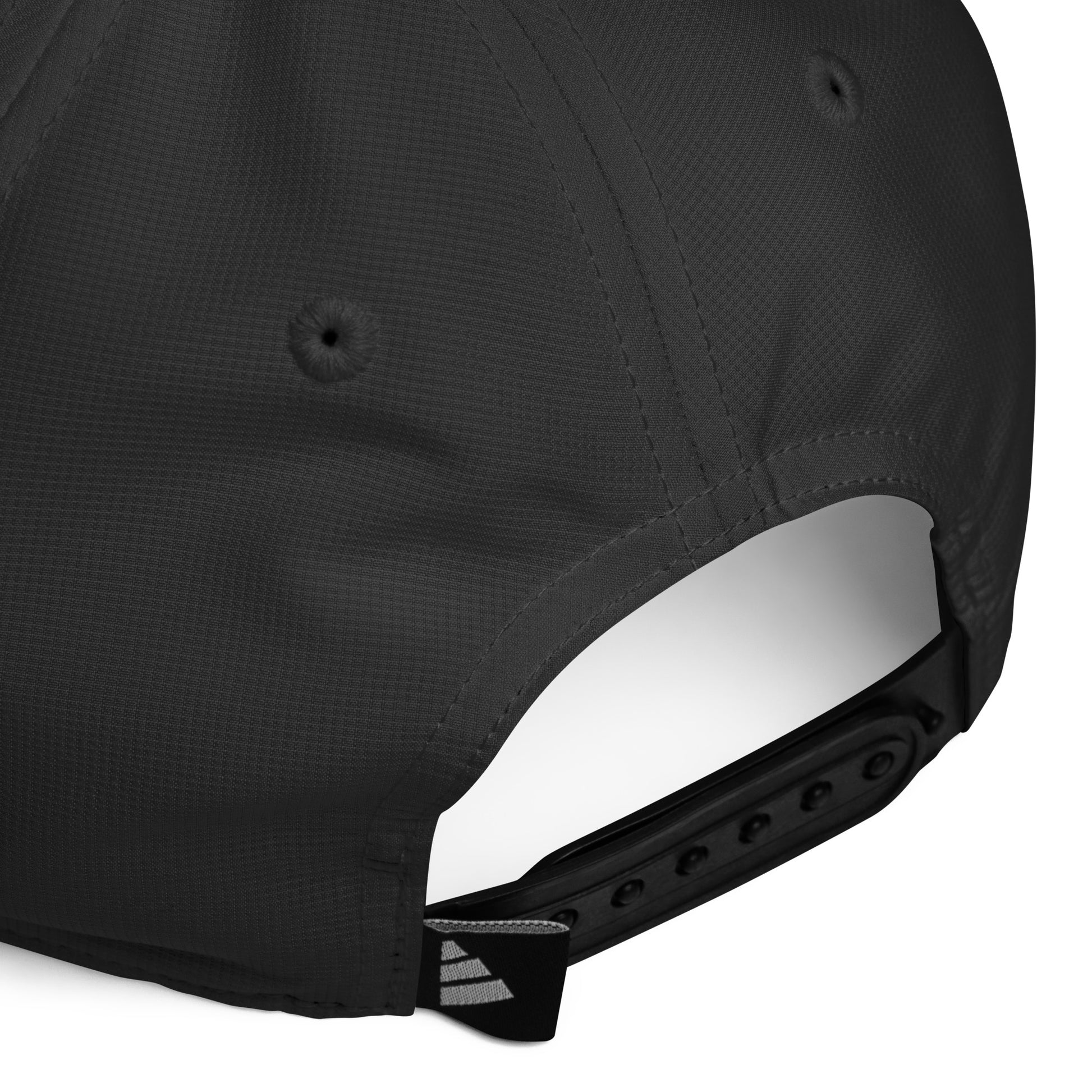 Close-up view of adjustable strap on black Adidas® Pickleball Performance Cap with Adidas® logo
