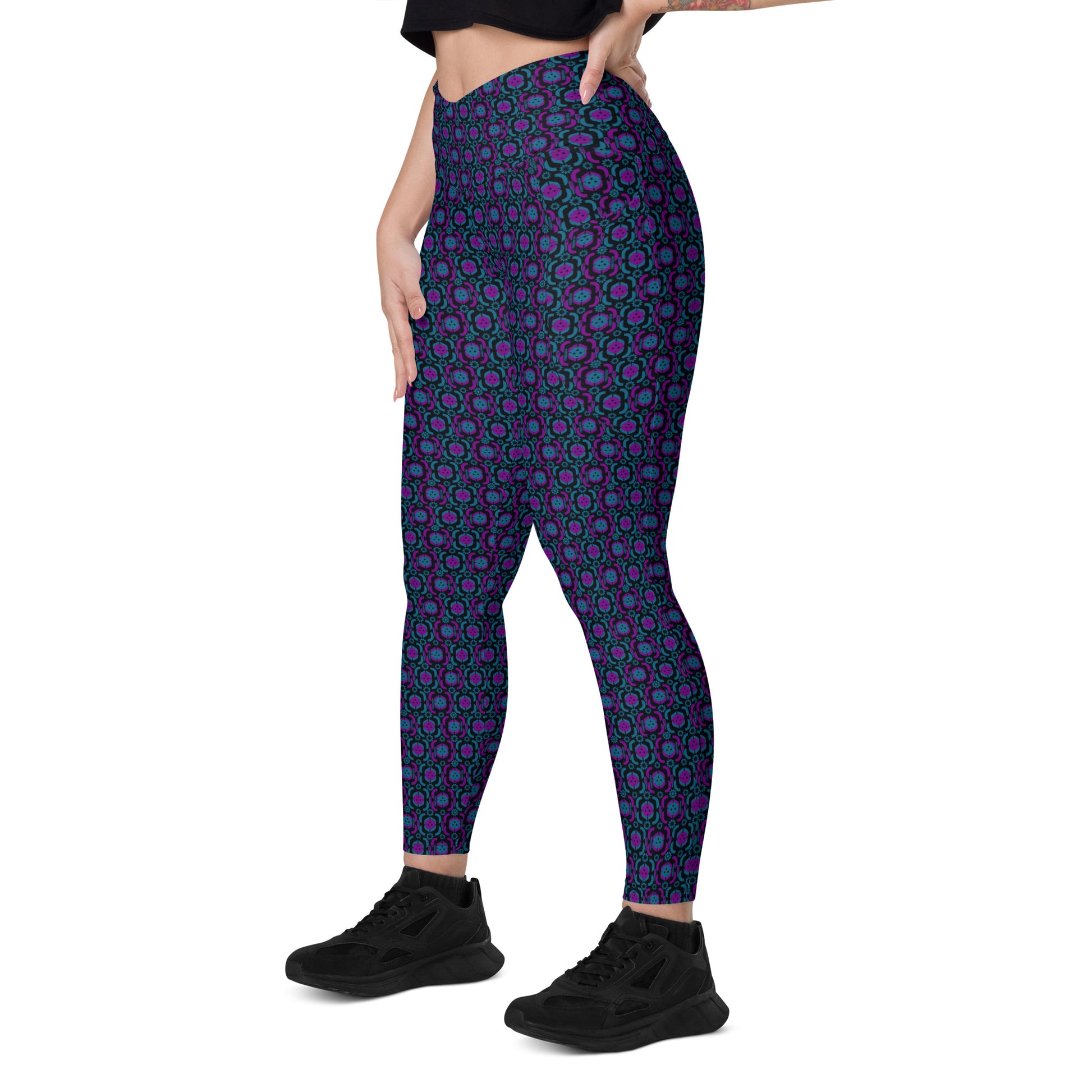 High-waisted pickleball leggings with a striking purple and blue geometric print, featuring a flattering V-shape waistband and convenient side pockets. Ideal for workouts, pickleball matches, and casual wear. 