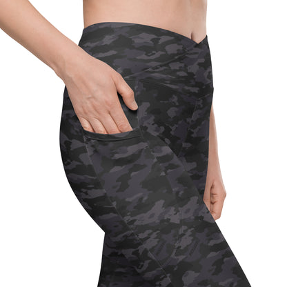 Close-up view of the side pocket on Stealth Camo Pickleball High-Waisted Crossover Leggings, featuring a dark camouflage pattern and demonstrating the convenient storage space.