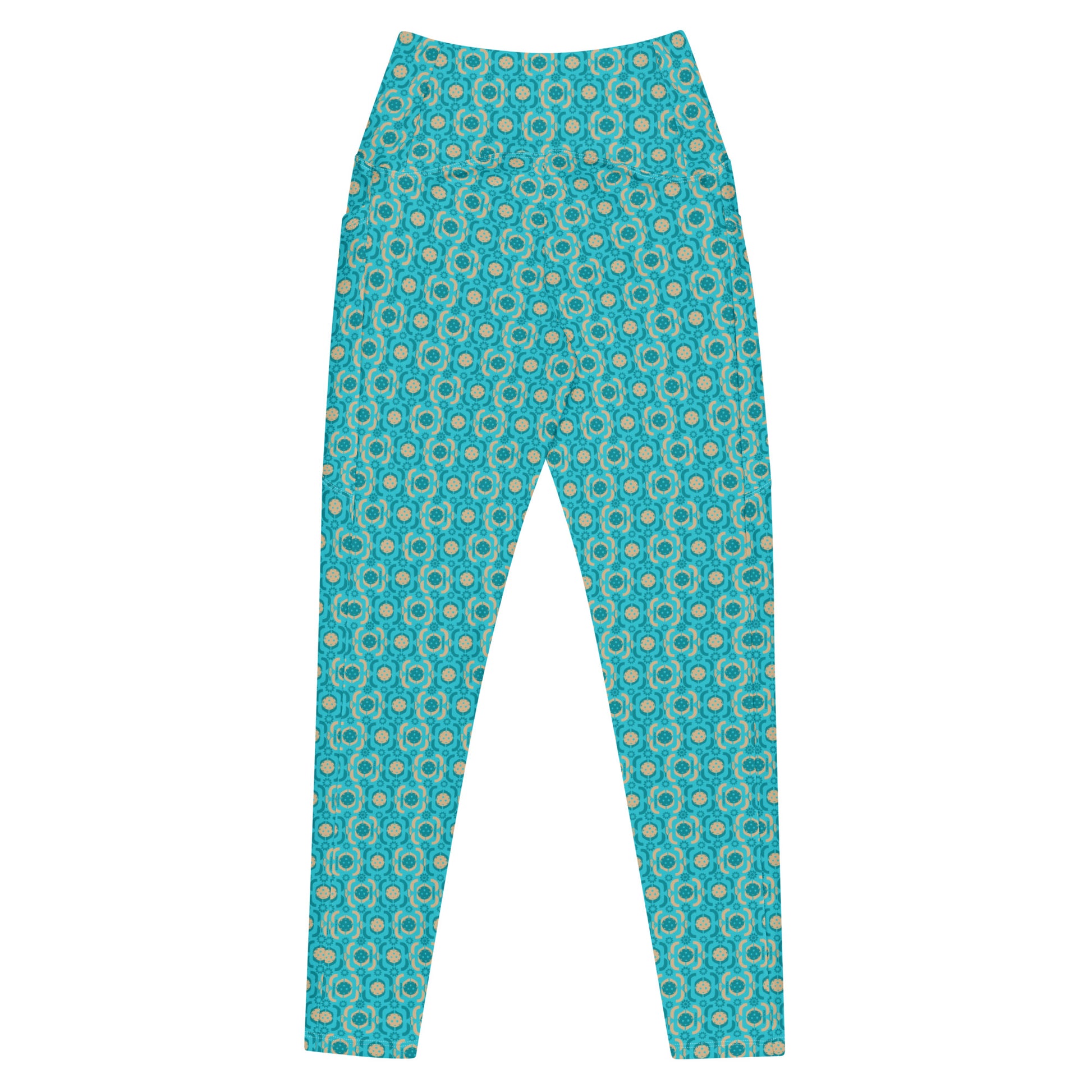 Vibrant turquoise pickleball leggings with intricate circle pattern, showcasing a snug, high-waisted fit and dual side pockets for convenience during games.