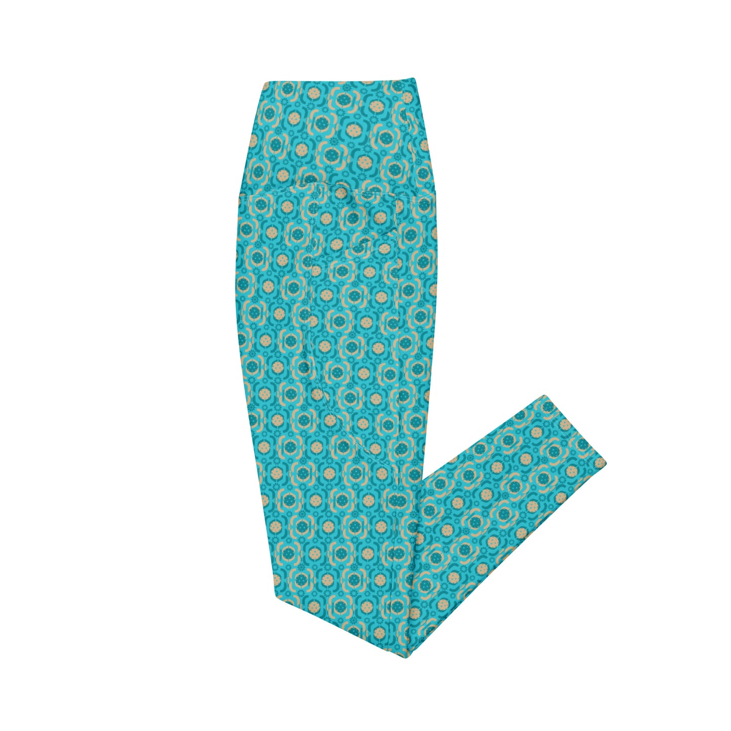 Side angle of turquoise pickleball leggings highlighting the practical side pocket feature, perfect for carrying essentials while on the court.