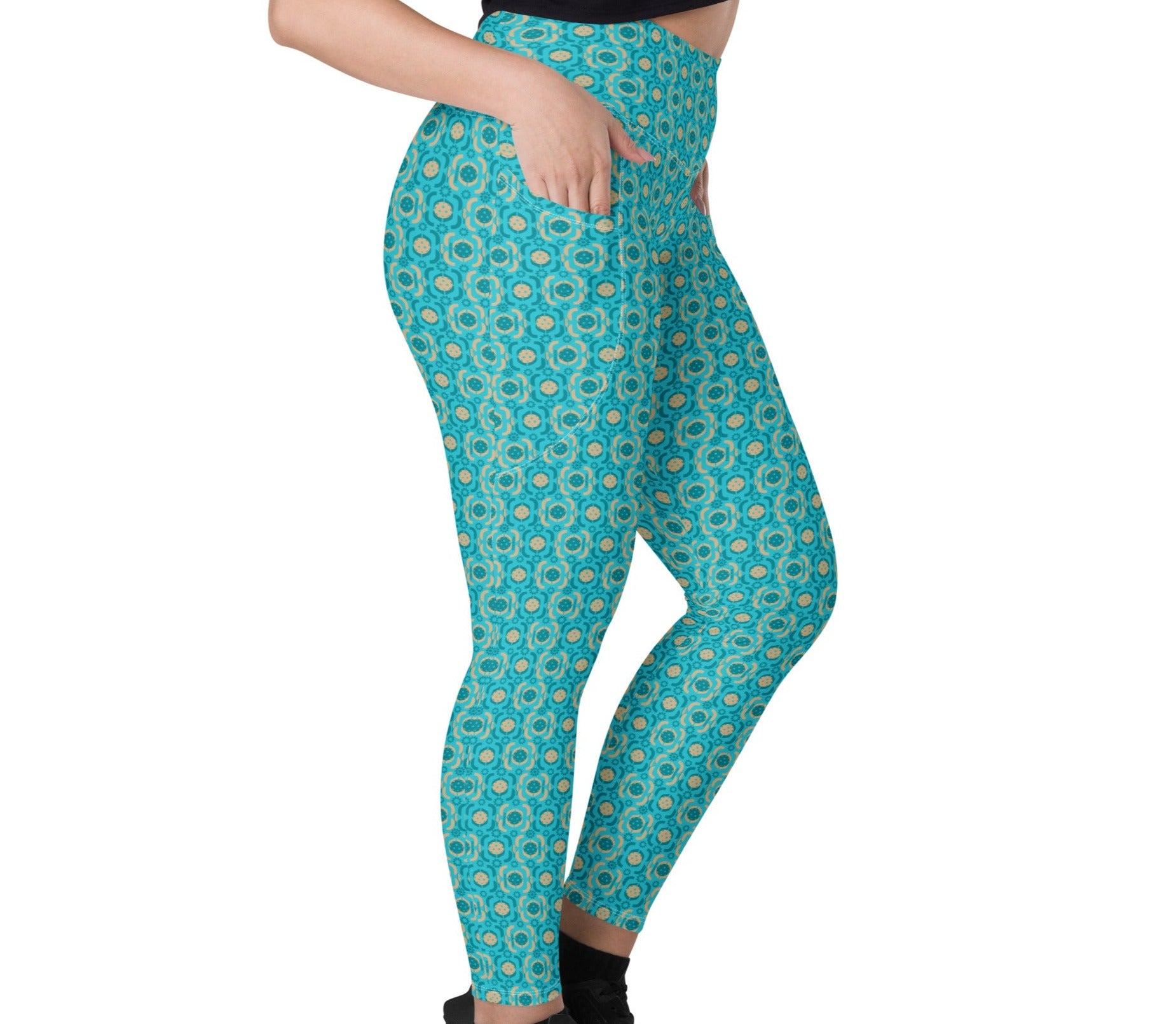 Model wearing turquoise pickleball leggings demonstrating the fit and style, ideal for pickleball enthusiasts looking for both performance and fashion.