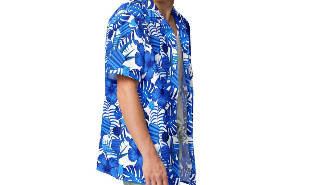 Model wearing the Tropical Blue Botanical Pickleball Lovers Oversized Button-Up Shirt, emphasizing the relaxed fit and vibrant blue floral design with pickleball paddles and balls.