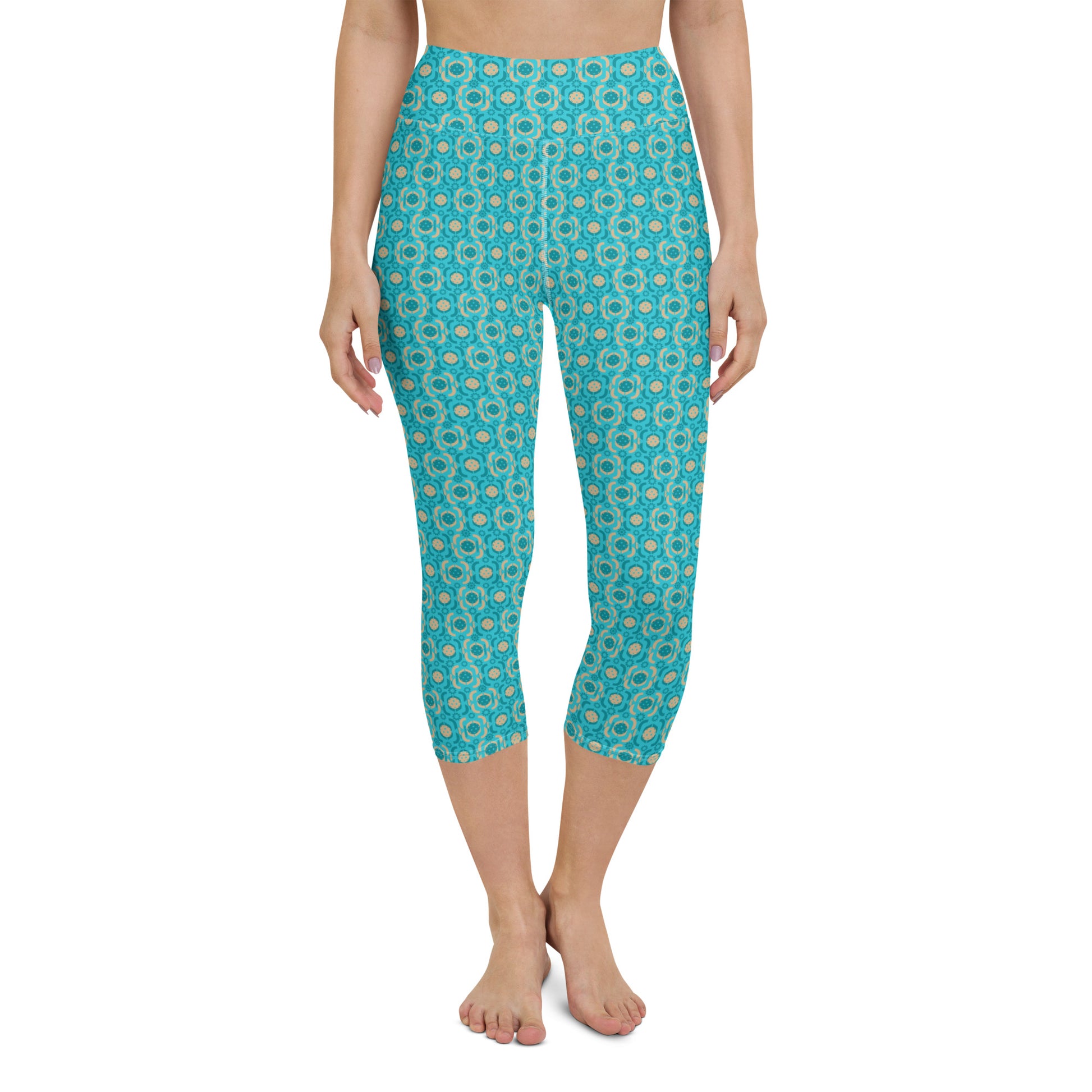 Front view of a model in Turquoise Tranquility Yoga Capri Leggings, showing the high-waist design and seamless fit, perfect for athletic pursuits or leisure.
