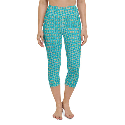 Front view of a model in Turquoise Tranquility Yoga Capri Leggings, showing the high-waist design and seamless fit, perfect for athletic pursuits or leisure.