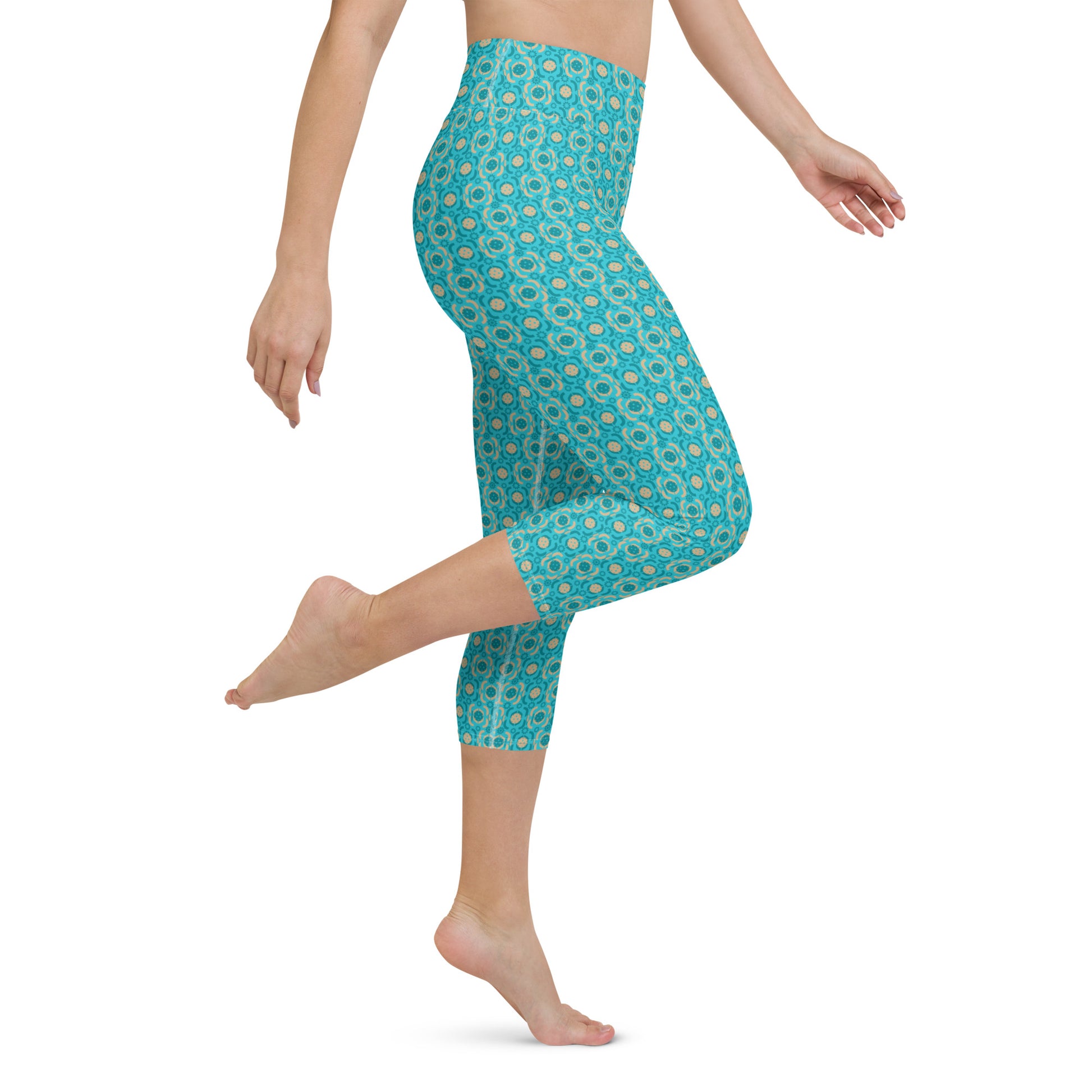 Close-up view of Turquoise Tranquility Yoga Capri Leggings with dynamic pose showing the flexibility and fit, perfect for pickleball enthusiasts looking for style and comfort.