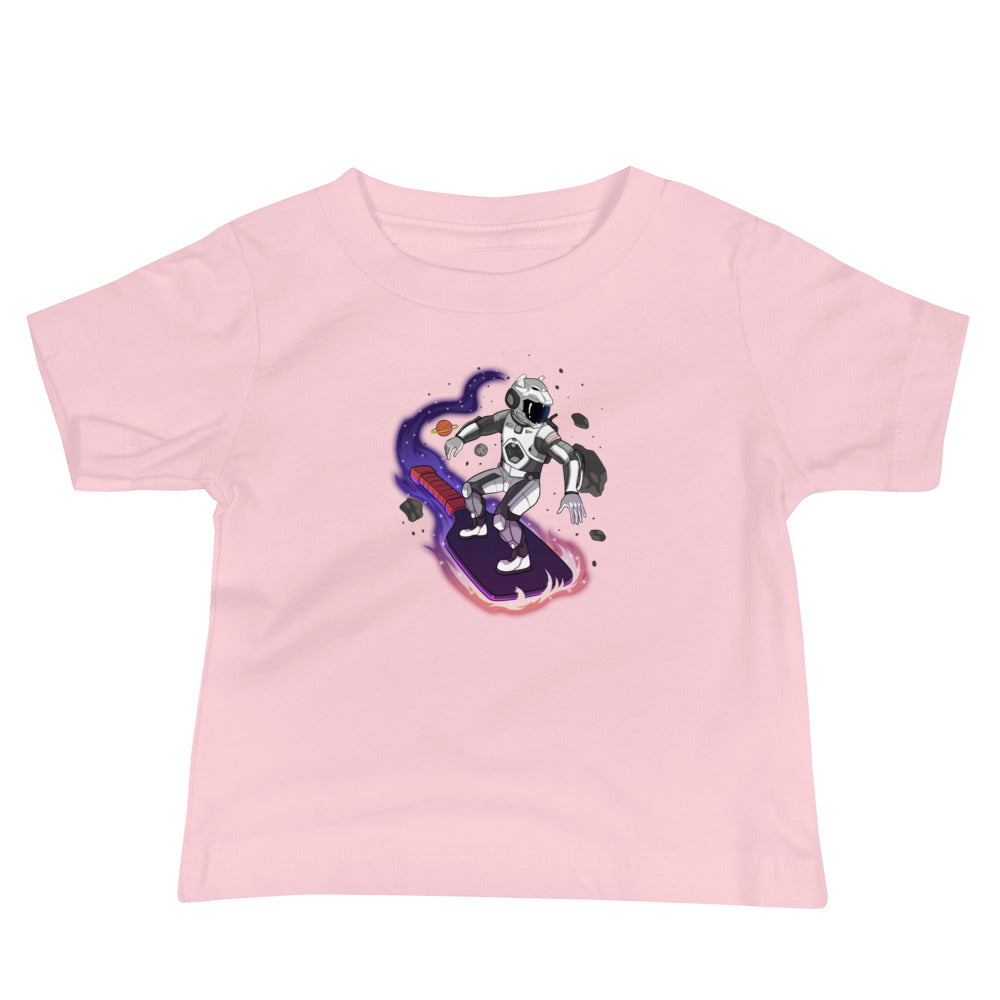 Pink baby t-shirt featuring a space surfer robot riding a pickleball paddle through space.