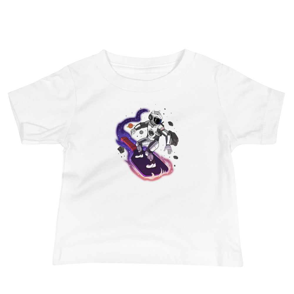 White baby t-shirt featuring a space surfer robot riding a pickleball paddle through space.