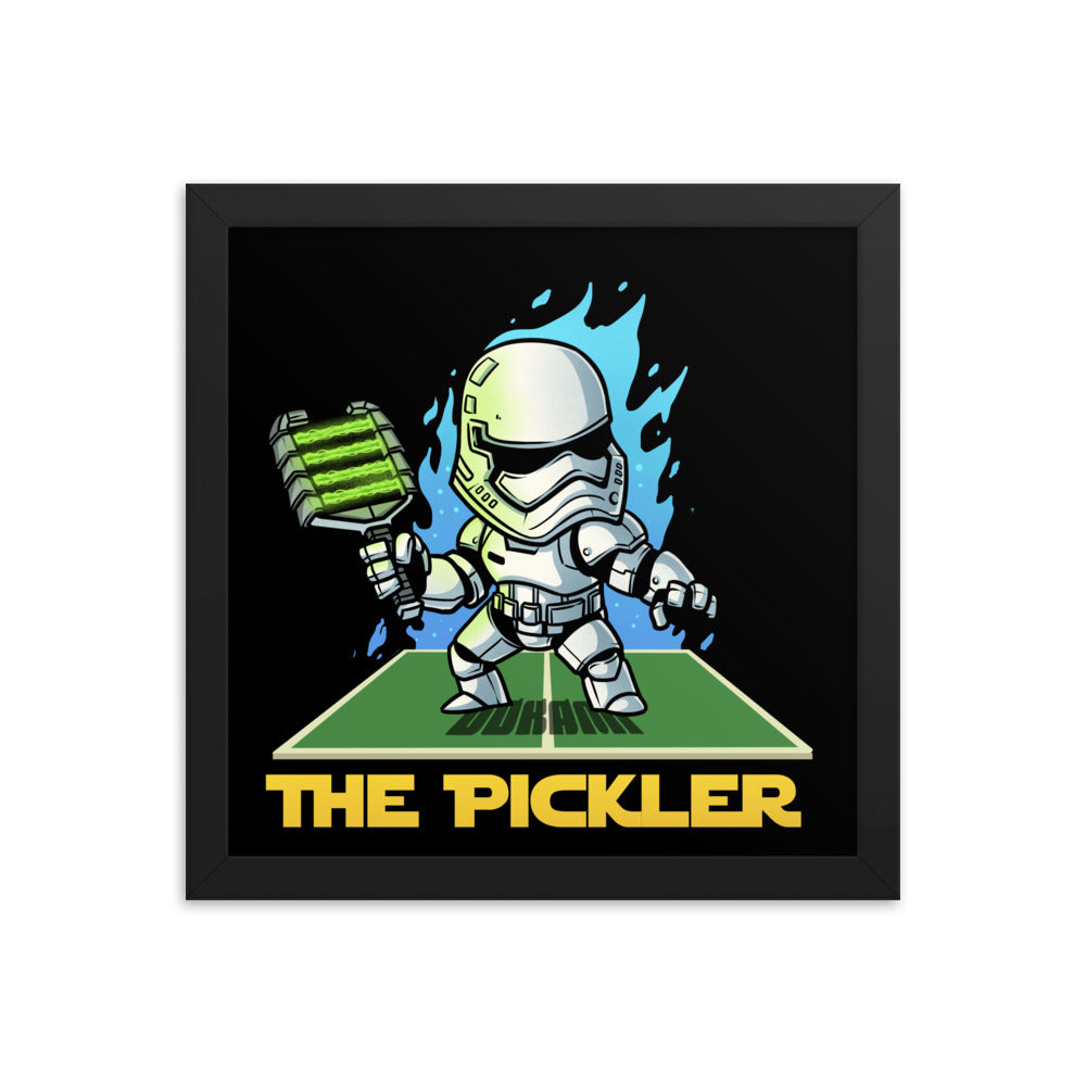 12x12 square framed poster of 'The Pickler Stormtrooper', combining Star Wars and pickleball themes, in a stylish black frame.
