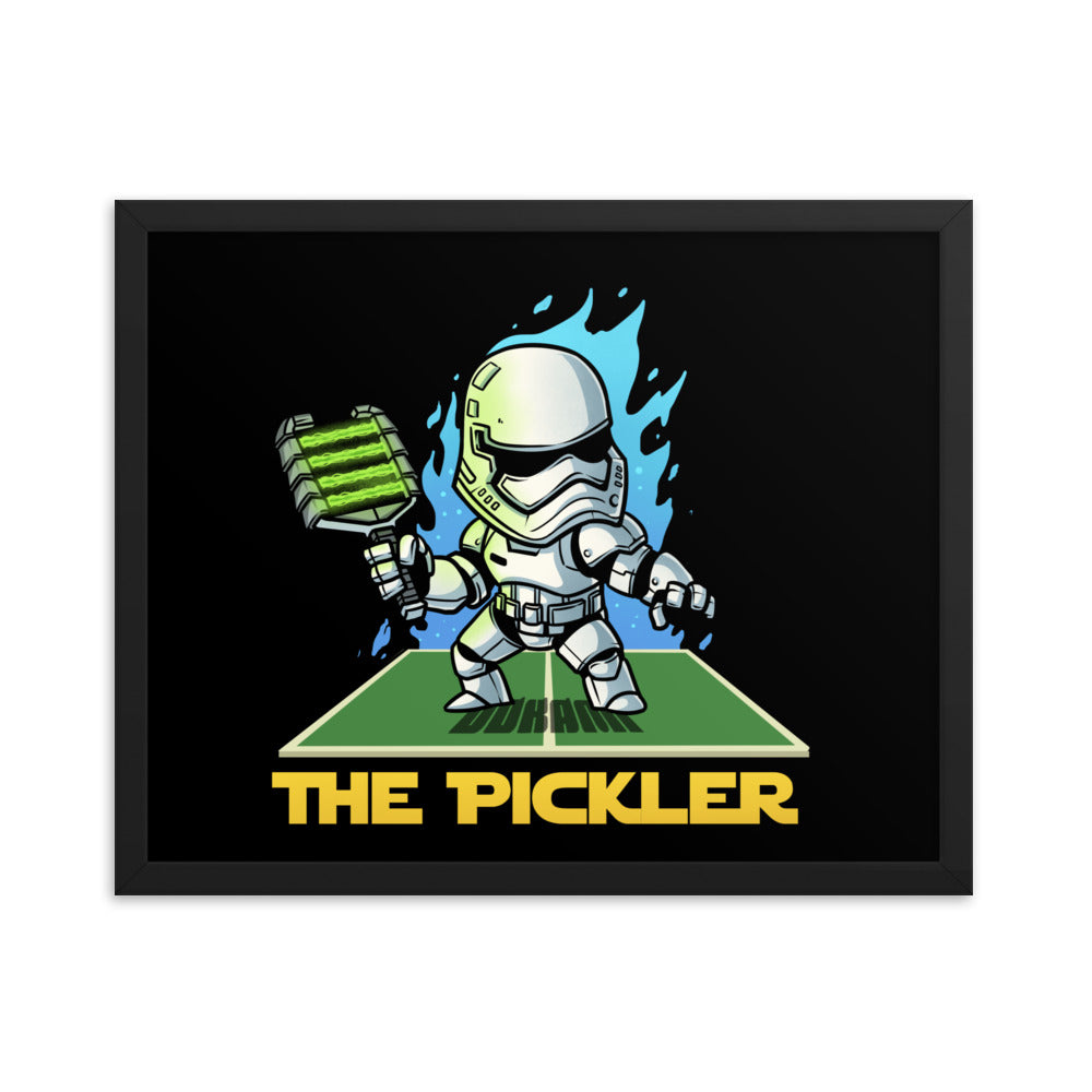 16x20 framed poster displaying 'The Pickler Stormtrooper' with a stormtrooper-themed pickleball player, complete with a pickleball paddle, encased in a black frame.