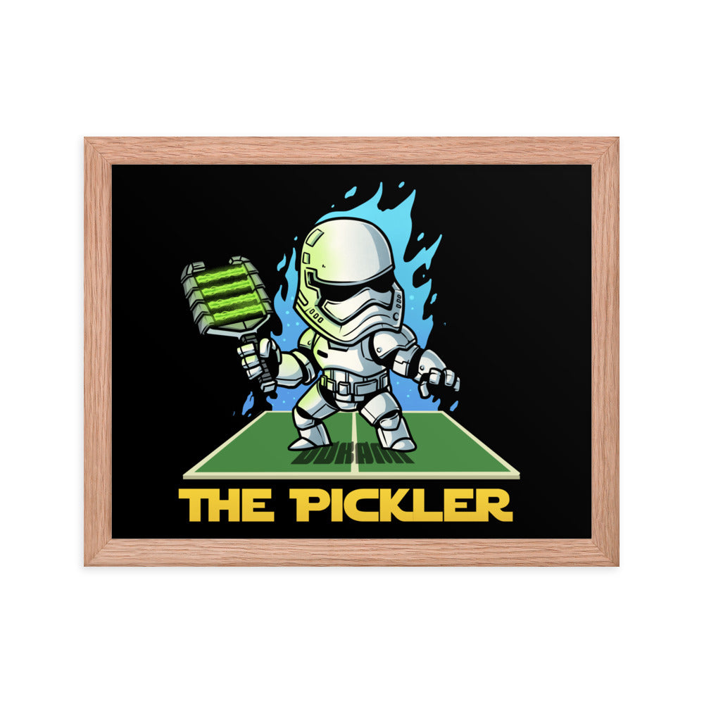 Medium-sized 11x14 inch framed poster of 'THE PICKLER', depicting a playful stormtrooper character on a pickleball court, framed elegantly in red oak