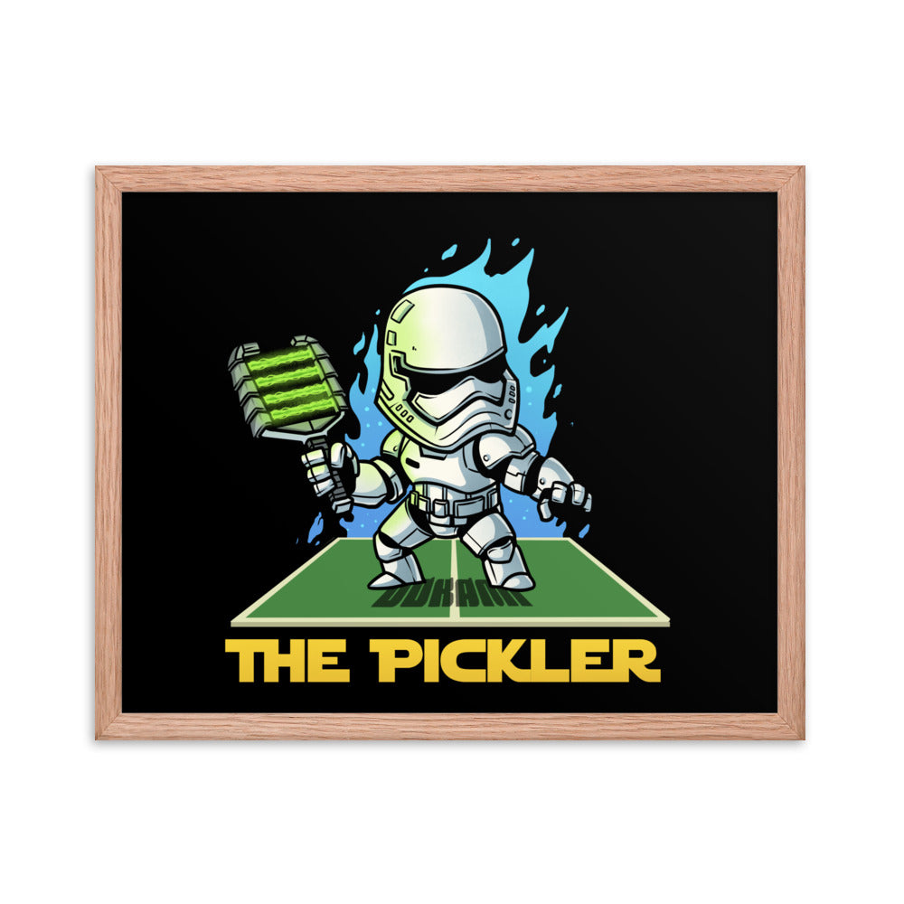 A 16x20 vertical framed poster in a red oak frame, featuring a Star Wars Stormtrooper-themed character named 'The Pickler' in an action pose with a pickleball paddle, against a dark backdrop with electric blue accents.