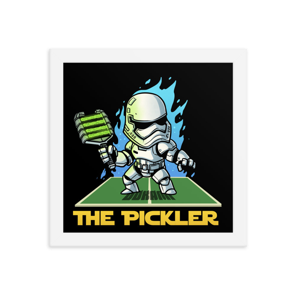  (10x10 inches): "Compact square framed poster showing 'The Pickler', a stormtrooper-inspired character playing pickleball, with dynamic blue flame effects, surrounded by a white frame.
