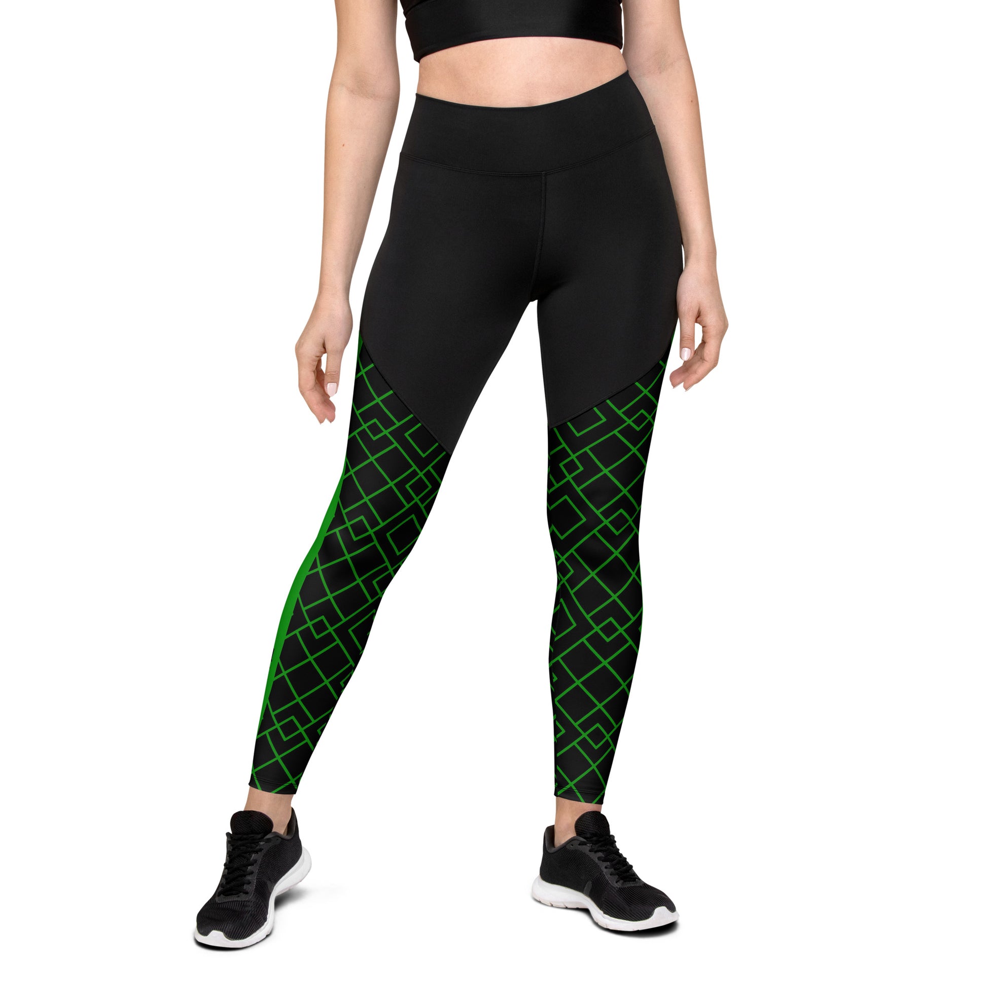 Front view of a woman wearing Neon Grid Pickleball Sports Leggings, showcasing the slimming high-waisted cut and striking green and black grid pattern.