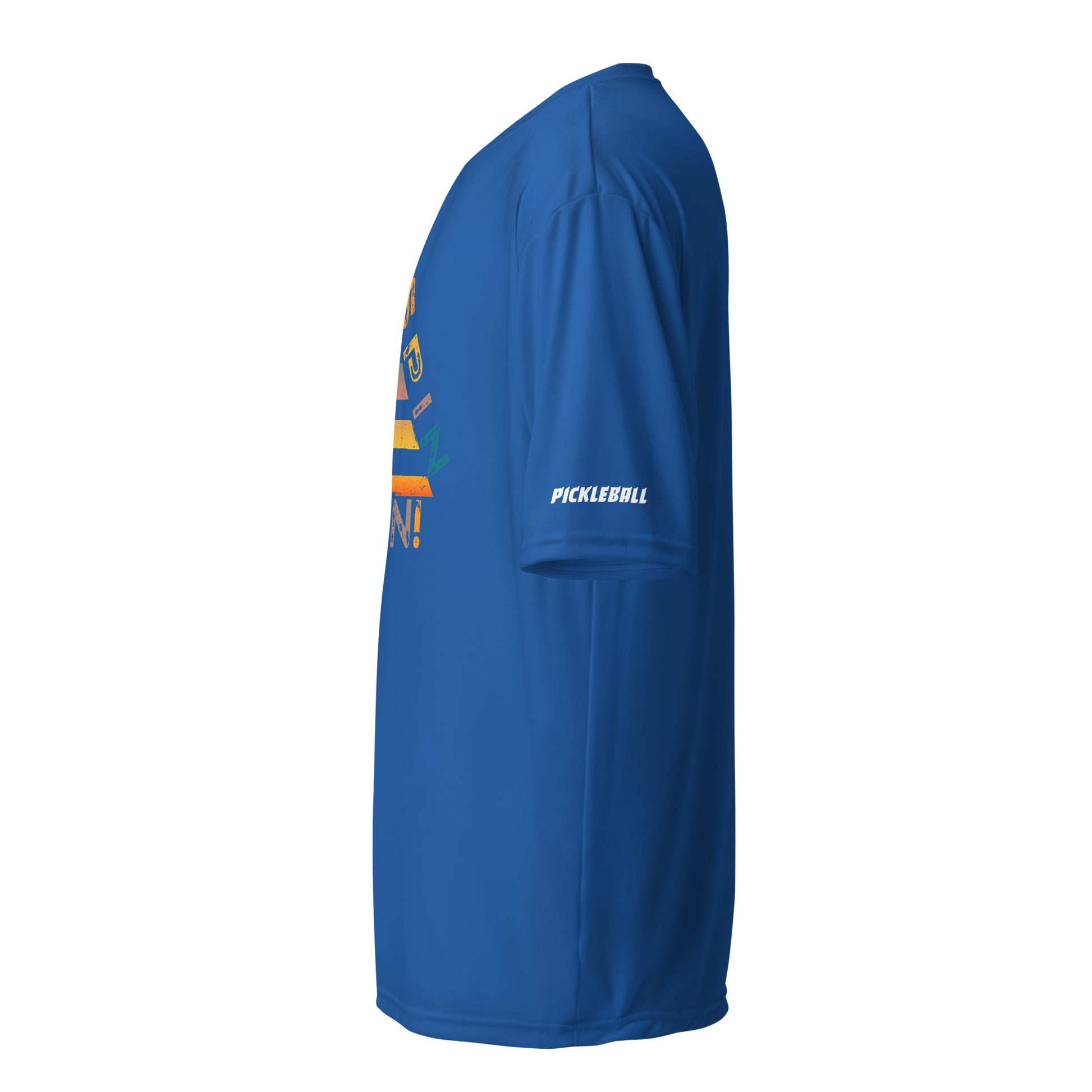 Side view of a royal blue unisex pickleball performance shirt with 'Smash Spin Win' design by OOKAMI SPORTS.