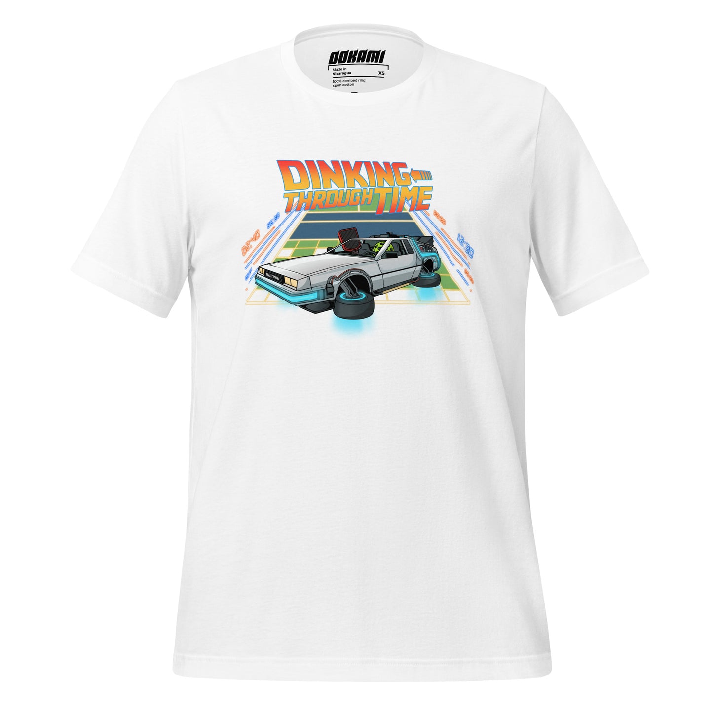 White pickleball T-shirt featuring a DeLorean on a pickleball court that transitions into a radiant neon grid, with the text 'Dinking Through Time' in bold, retro font from OOKAMI SPORTS.