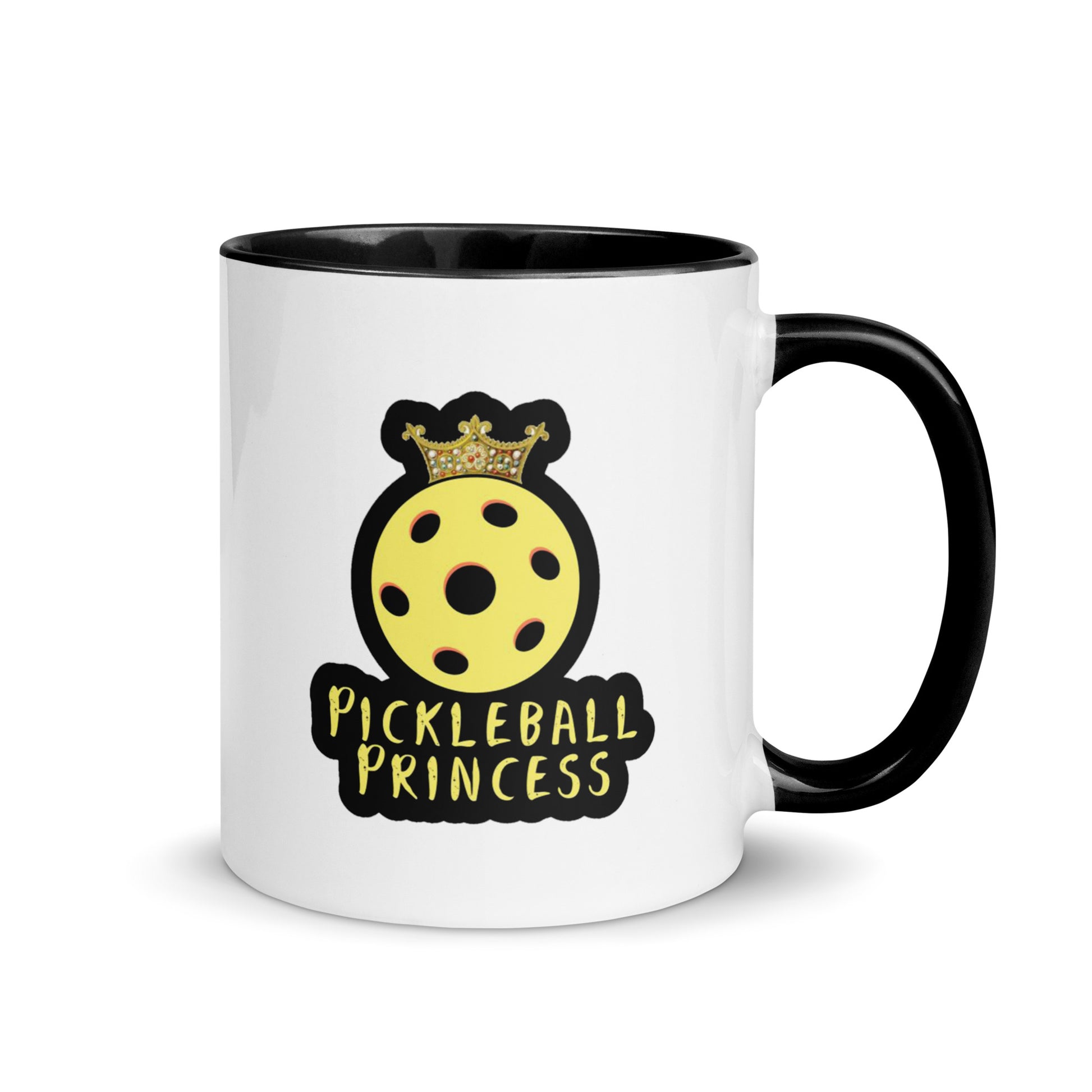 White ceramic mug with a black handle featuring the 'Pickleball Princess' design with a yellow pickleball wearing a crown.