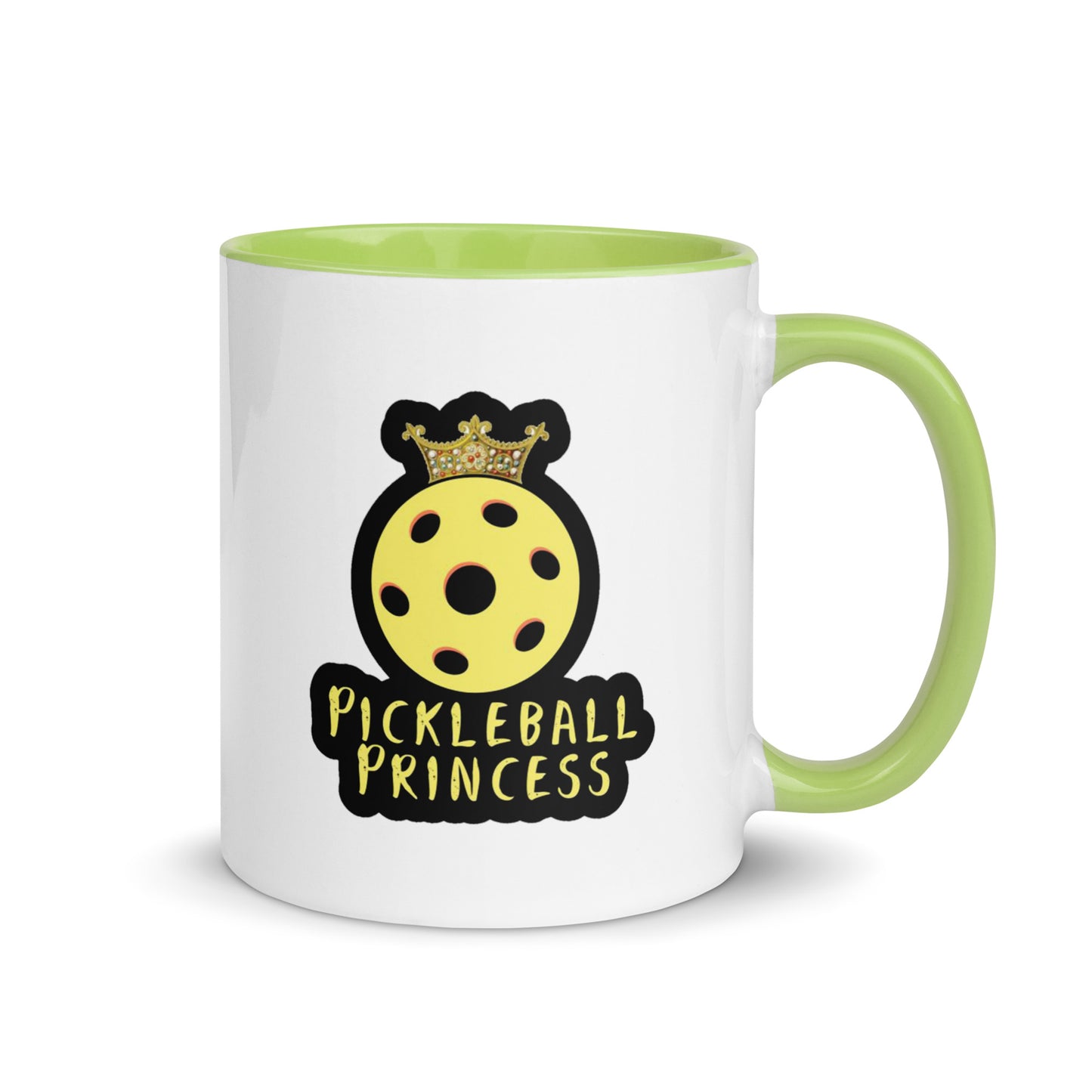 White ceramic mug with a green handle featuring the 'Pickleball Princess' design with a yellow pickleball wearing a crown.