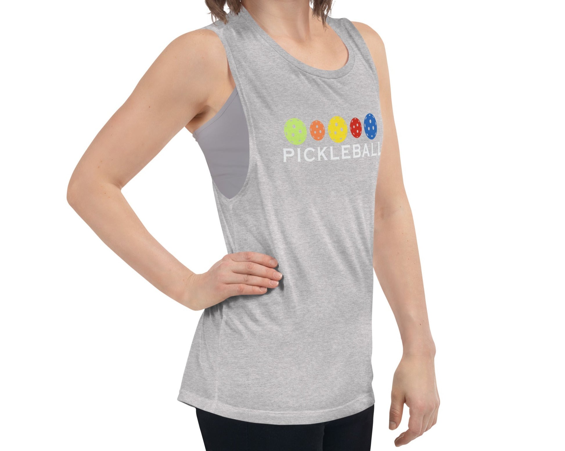 Woman posing in a grey Women's Muscle Tank Top with colorful pickleball design.