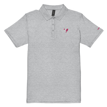 Sporty grey women's pickleball polo shirt modeled to highlight the semi-fitted design and side-seamed construction, suited for both sporting and casual occasions.