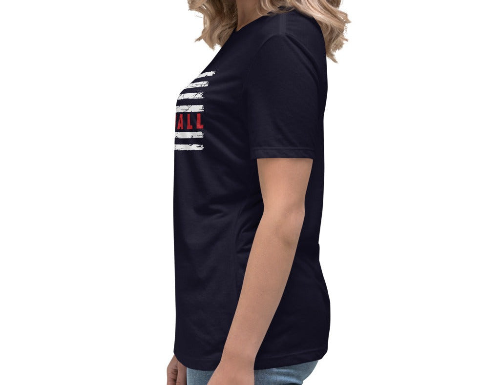 Side view of a woman wearing a navy Women's Relaxed T-Shirt with a USA flag and "Pickleball" design.