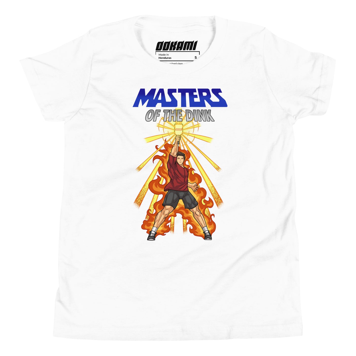 Youth size white t-shirt featuring a dynamic design inspired by He-Man and The Masters Of The Universe, showcasing a fierce pickleball player with a paddle, surrounded by flames and radiating energy.